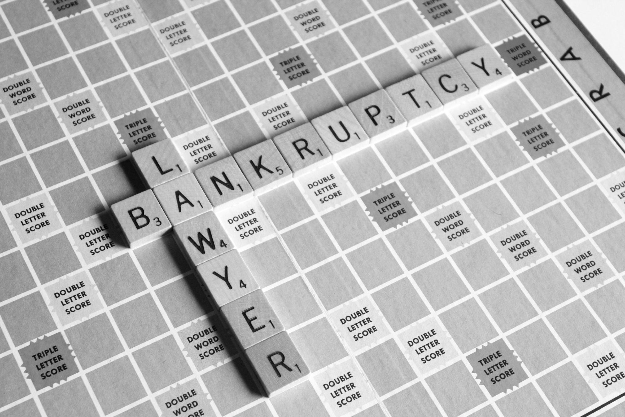 Scrabble board with word "bankruptcy"