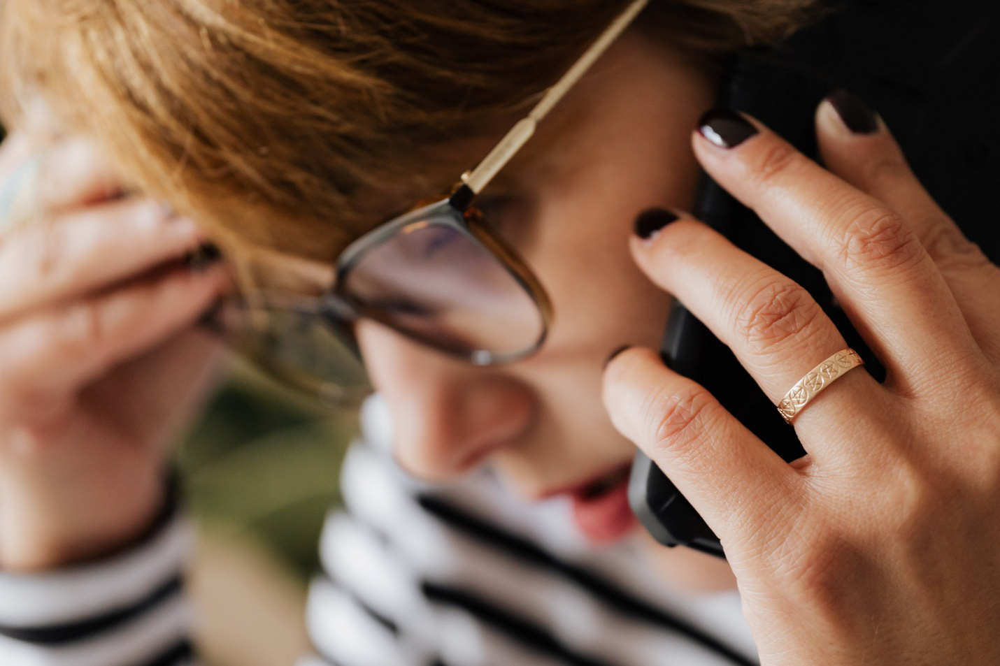 A worried-looking woman on a call.