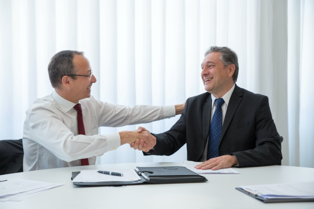 Two people shaking hands