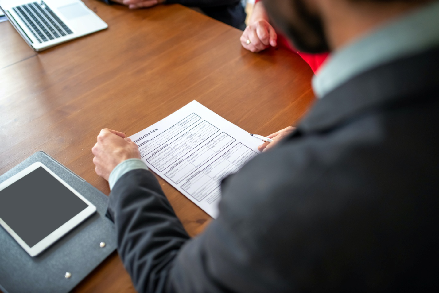 A man reviewing a form