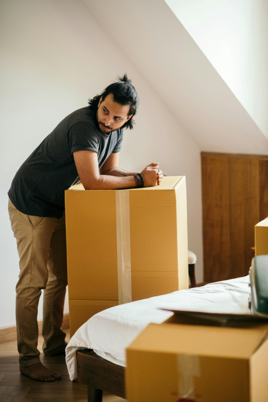 A man against on a box