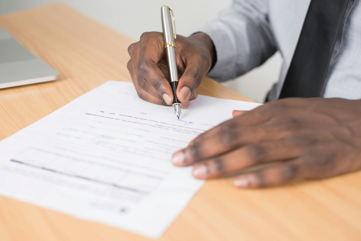 A person signing a document