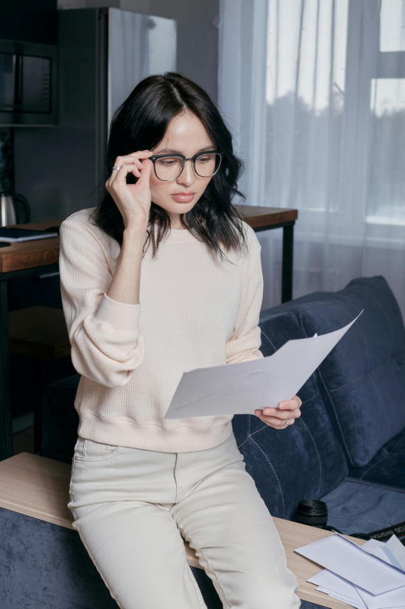 A woman reading a document