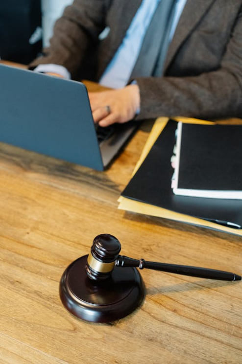  A lawyer working with a wooden gavel on the table, symbolizing legal assistance for debt relief in Robstown.