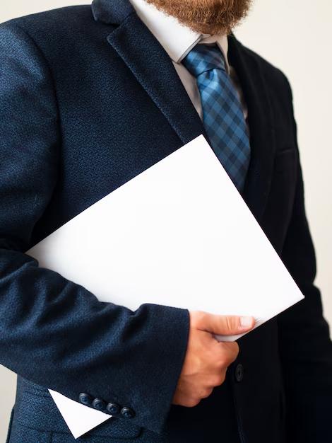 A debt relief lawyer holding a document