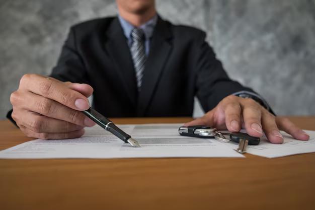  A man signing a document