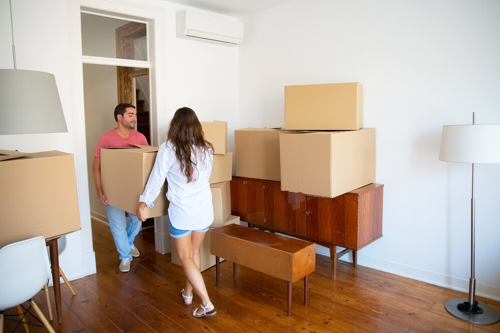 A couple moving out of a house