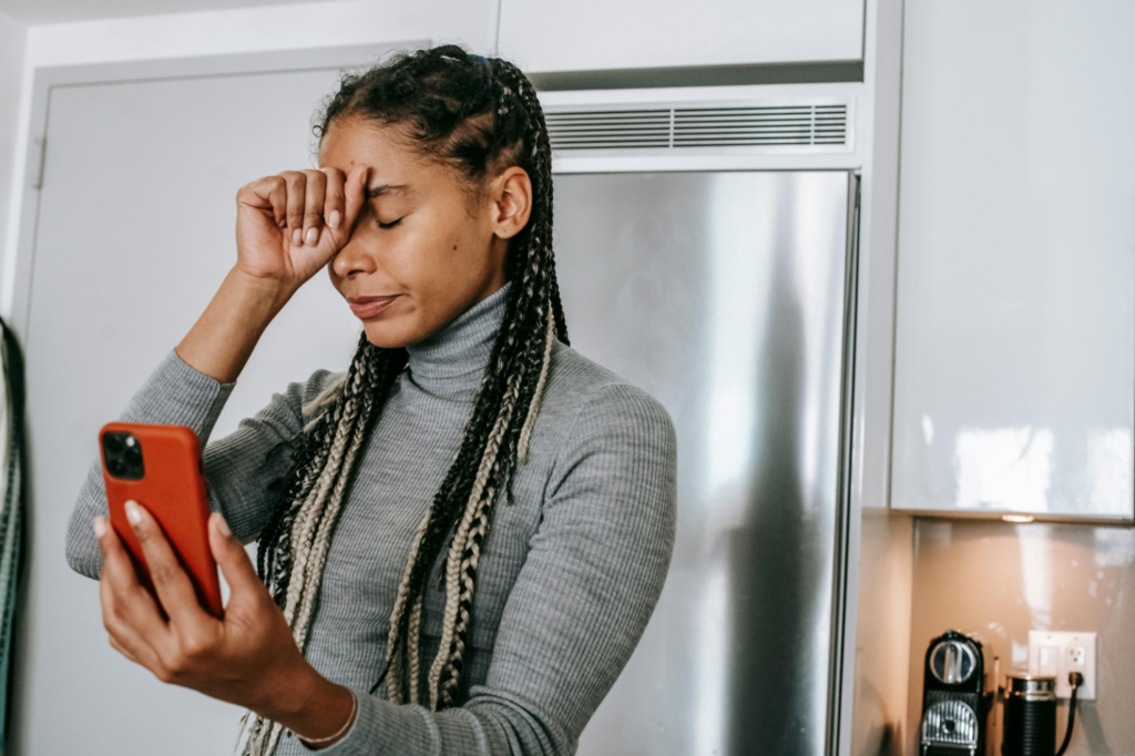 A woman looking at her phone