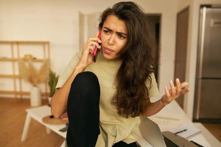 A woman speaking on the phone