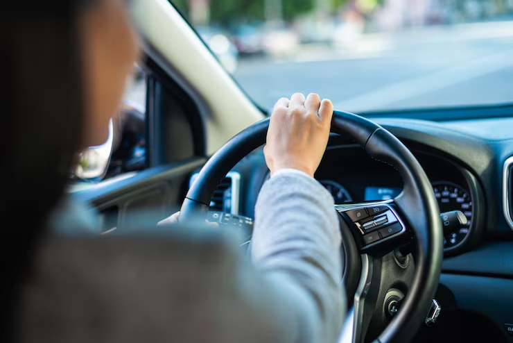 A woman driving a car