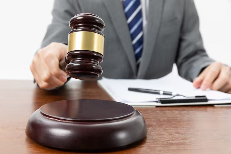 A person holding a gavel