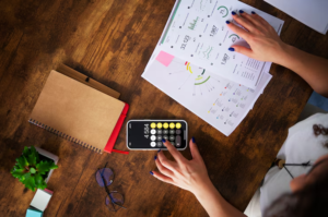 A person using a calculator
