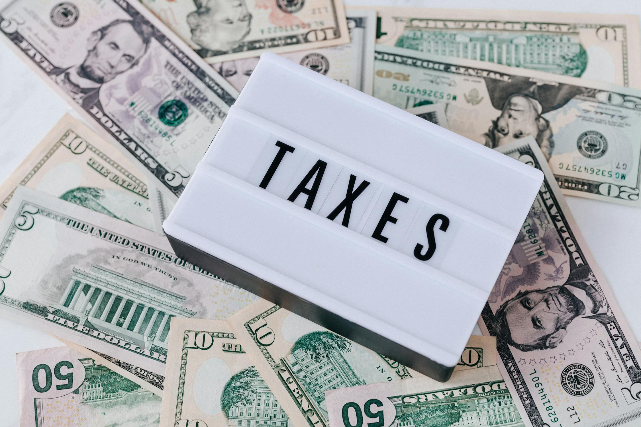 Taxes forms next to calculator