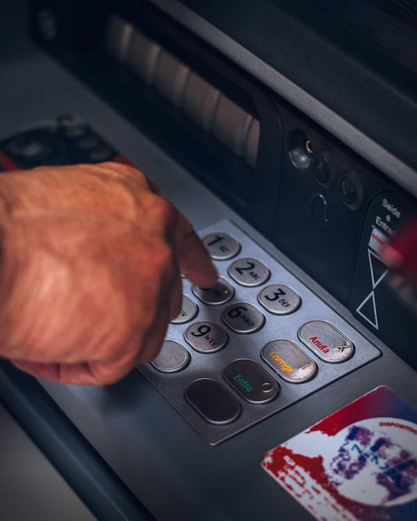 person-using-atm