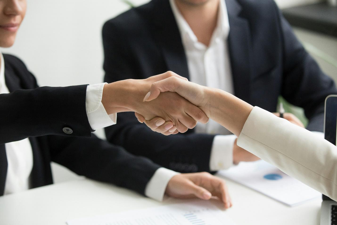 a handshake between professionals