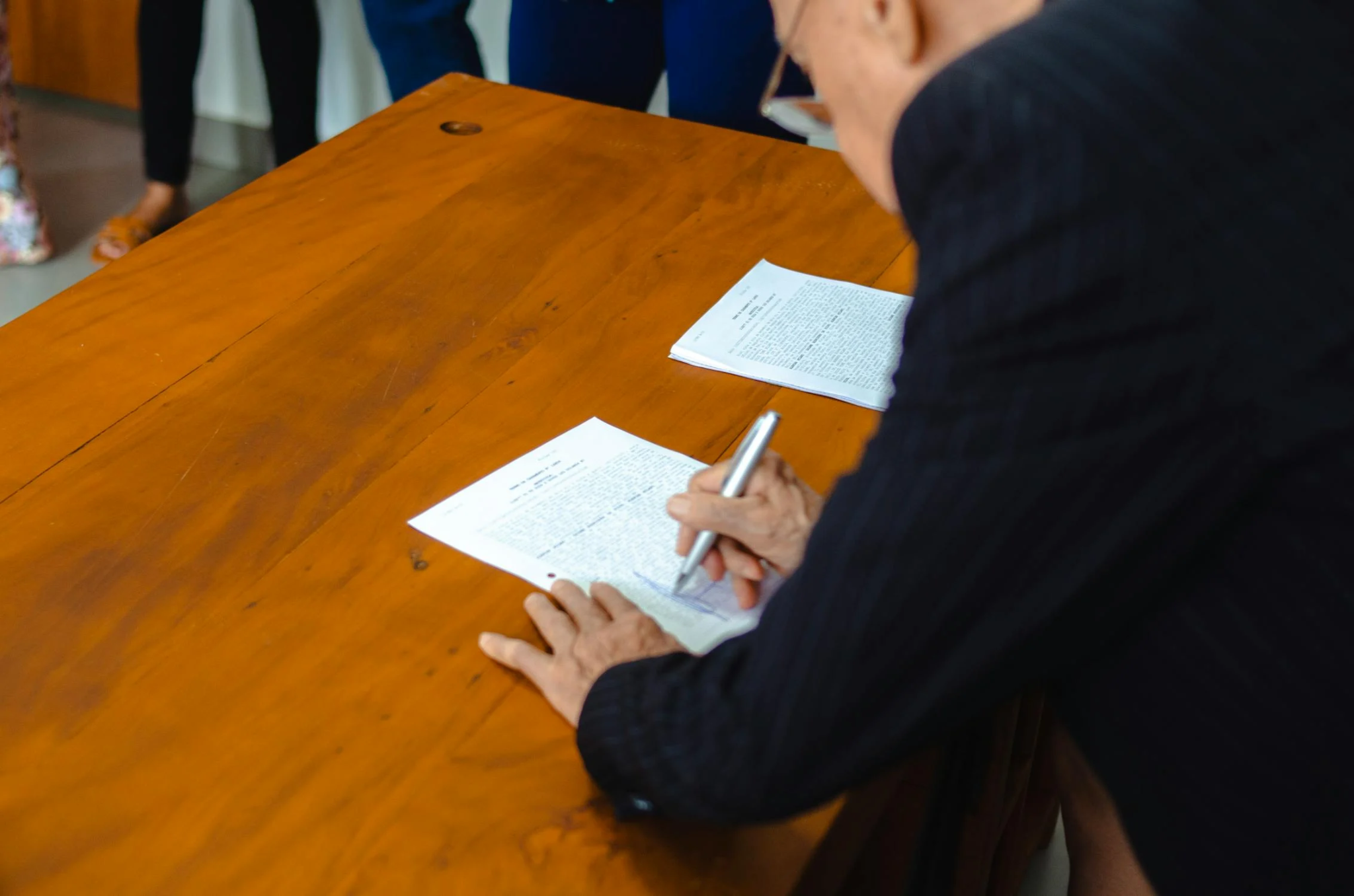 man signing