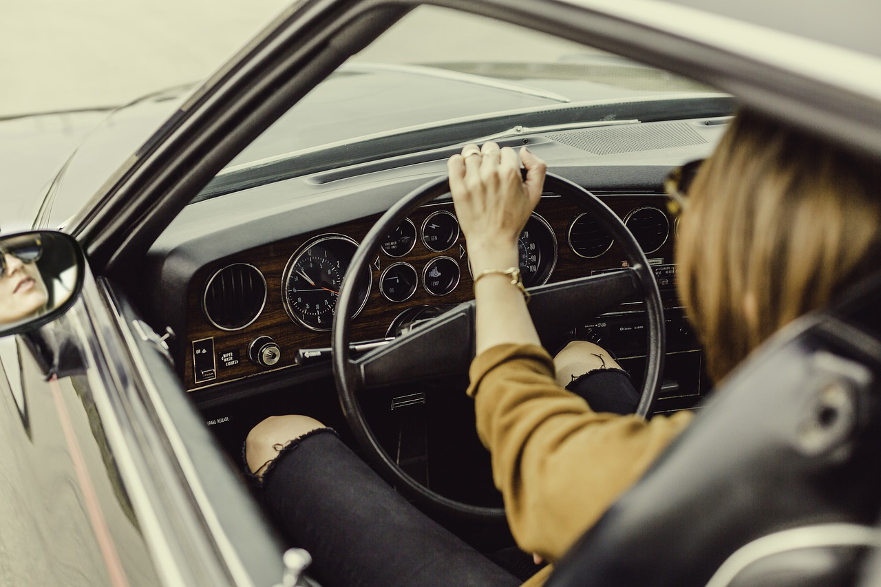 A woman driving a car