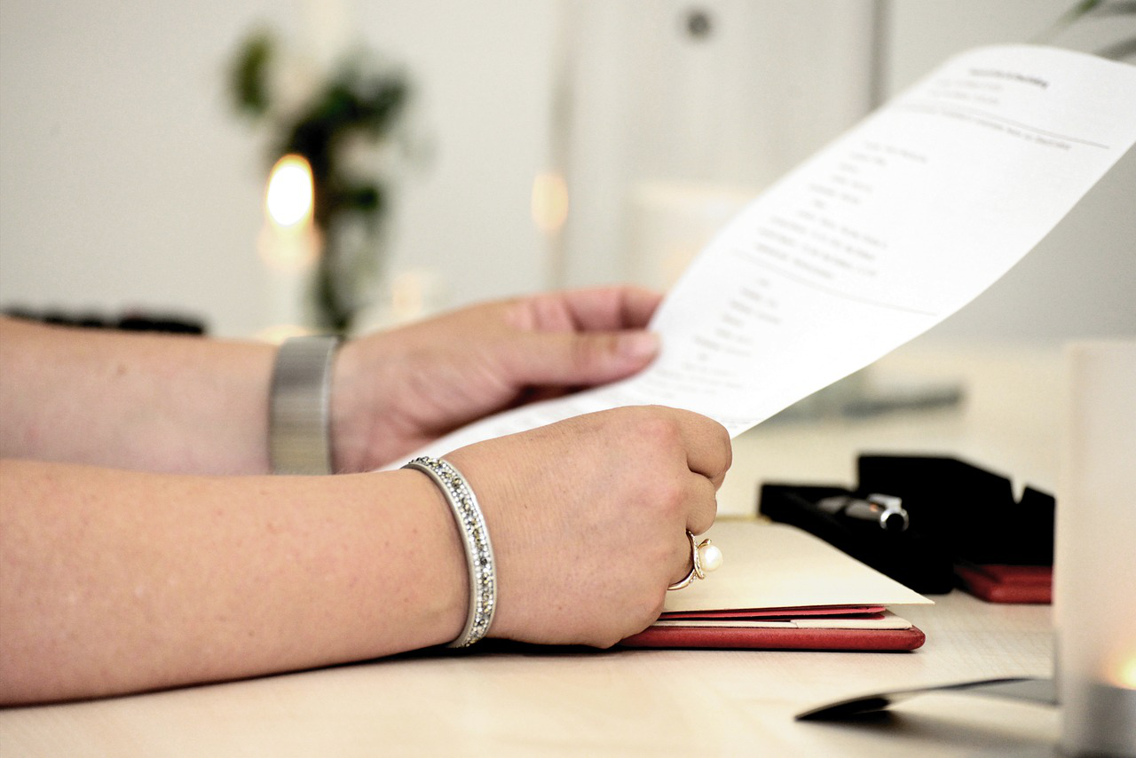 A person reviewing a document