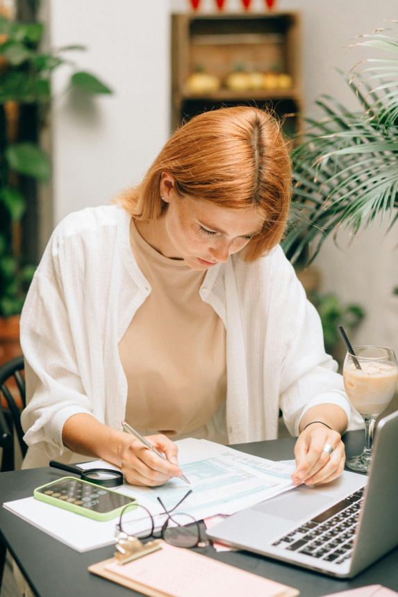 A woman reviewing a document