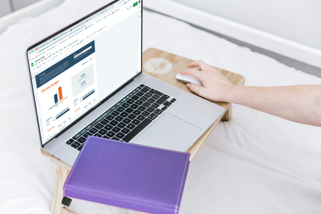 person using their laptop