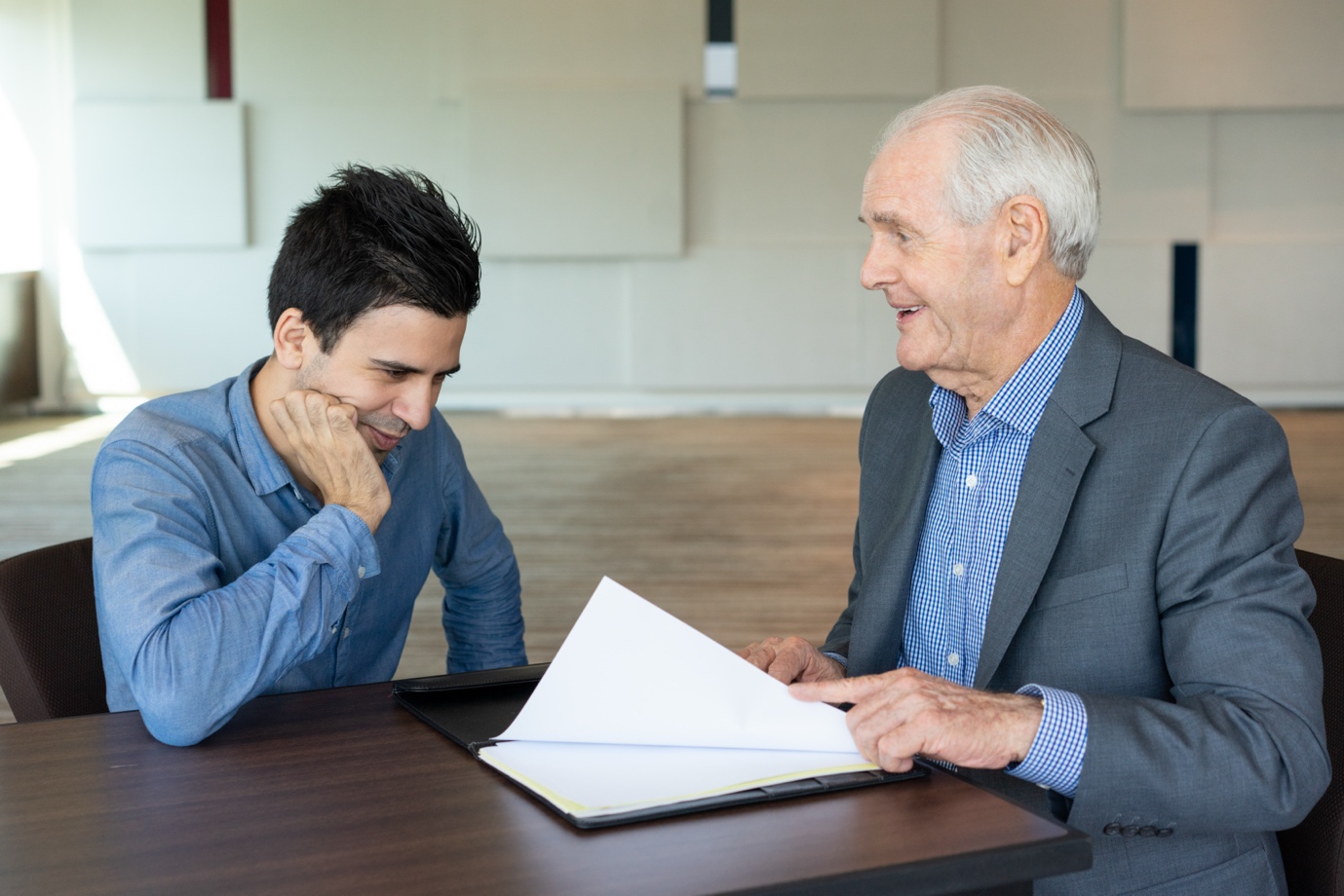 Attorney advising client on debt collector negotiations in Corpus Christi