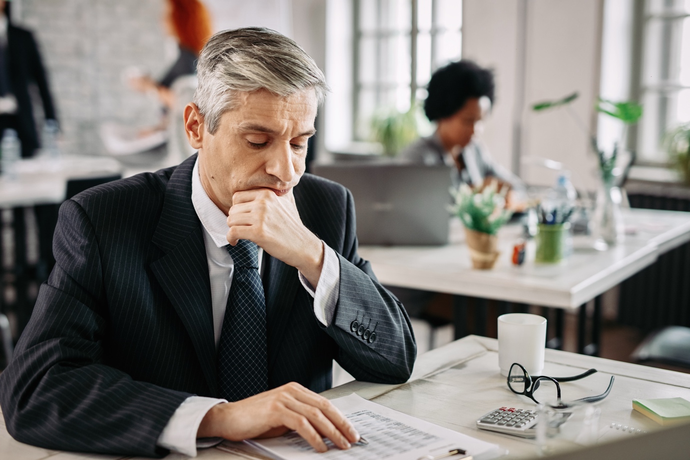 Texas bankruptcy lawyer discussing debt qualification with a client