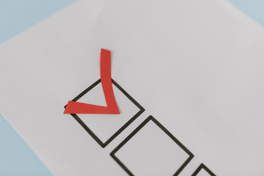 Red tick mark