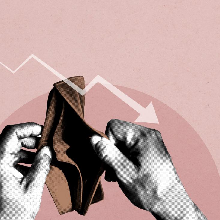 Empty wallet with downward arrow sign representing overwhelming debt