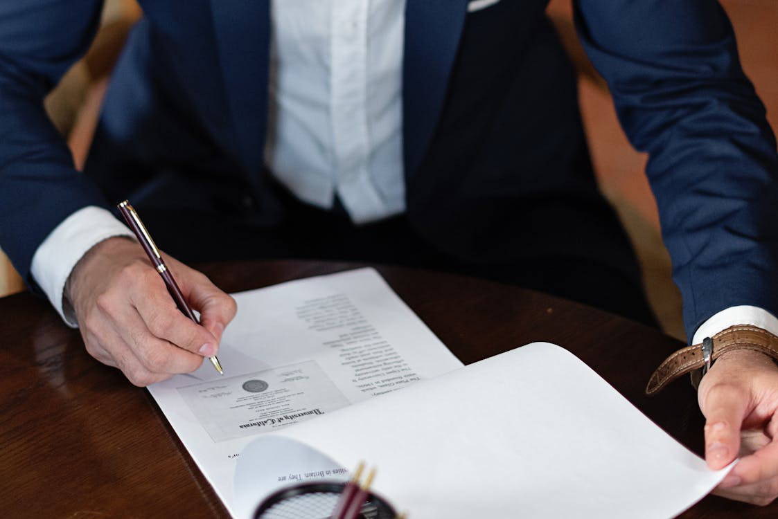 A person signing a document
