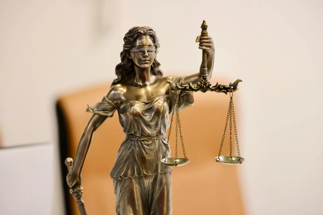 close-up of the statue of the Lady Justice with scales