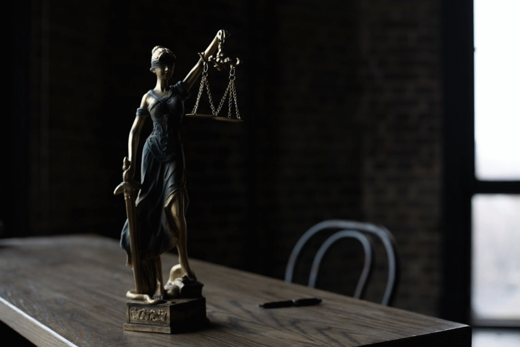 figurine of the Lady Justice on a table