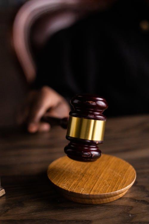  Judge striking a gavel in a courtroom