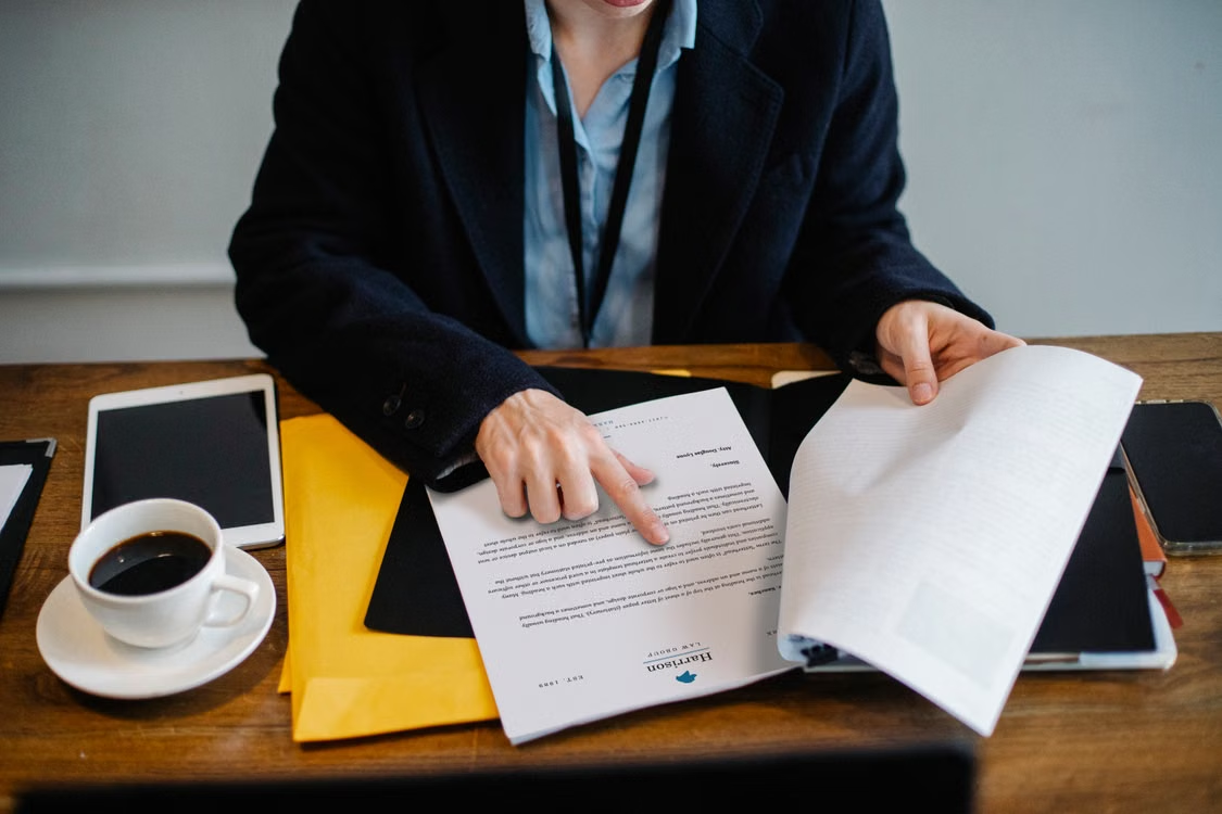 A person reviewing business documents